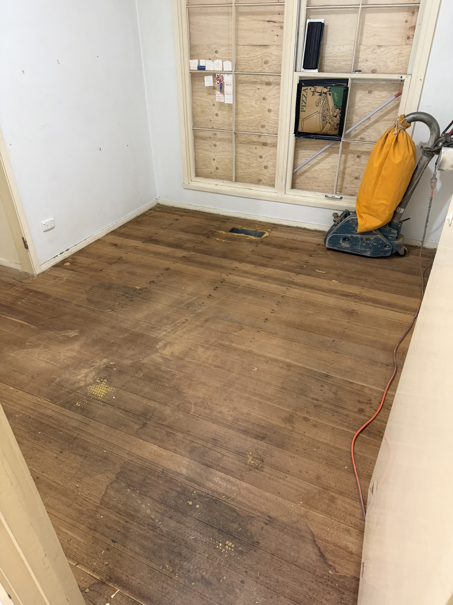 Bedroom floor restoration before sanding